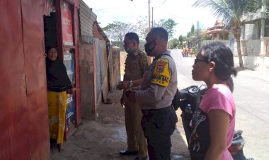 SOSIALISAI-ADAPTASI-KEBIASAAN-BARU,-BHABINKAMTIBMAS-KELURAHAN-TUAK-DAUN-MERAH-SAMBANG-WARGA