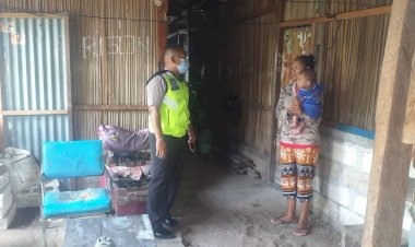 Tangkal-Covid-19,-Bhabinkamtibmas-Bripka-Ferdinan-Lalel-Imbau-Warga-Patuhi-Protokol-Kesehatan