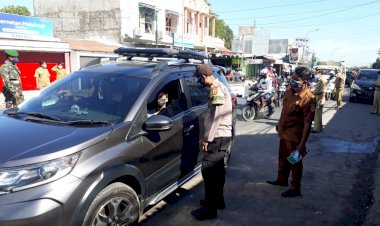 Laksanakan-Penertiban-Protokol-Kesehatan-Anggota-Polsek-Maulafa-Tegur-Warga-Yang-Beraktivitas-Tidak-Menggunakan-Masker