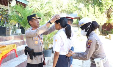 Kapolresta-Pimpin-Apel-Pagi-dan-Kukuhkan-Anggota-PKS-SMP-Negeri-5-Kota-Kupang