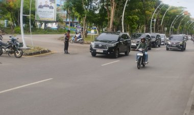 Pelayanan-di-Pagi-Hari,-Satsamapta-Polresta-Kupang-Kota-Bantu-Kelancaran-Aktivitas-Warga.