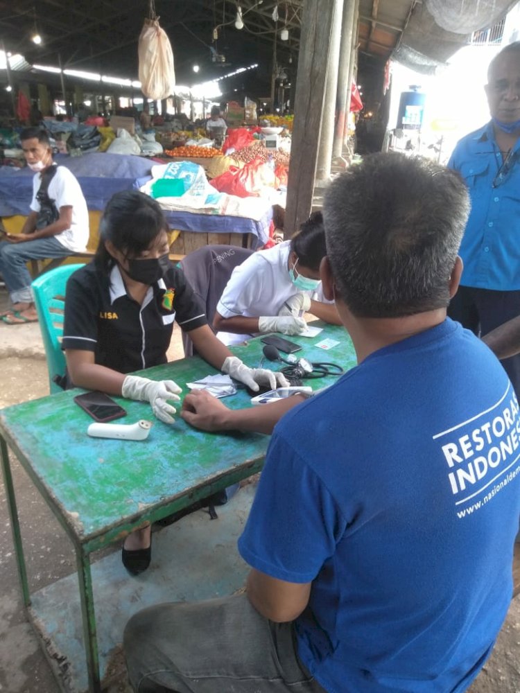 Gerai Vaksin Polri Polres Kupang Kota Mengelar Vaksinasi Di Pasar Inpres Naikoten 1 , Upaya Percepatan Vaksinasi Di Kota Kupang