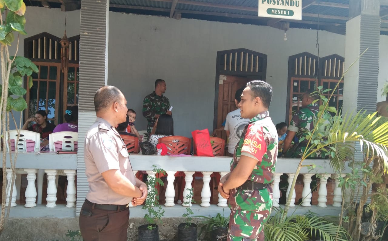 Bhabinkamtibmas Bersama Babinsa Kelurahan Merdeka Menyambangi Giat Posyandu